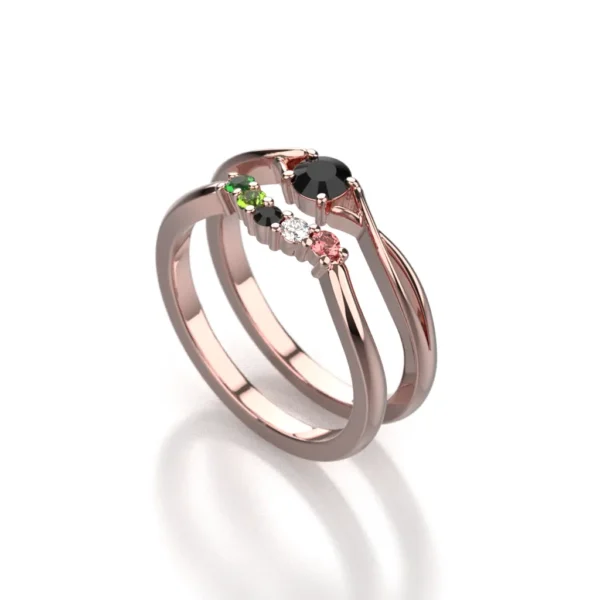 14k rose gold ring set with onyx, diamond, emerald, peridot, and pink tourmaline by Bruce Trick
