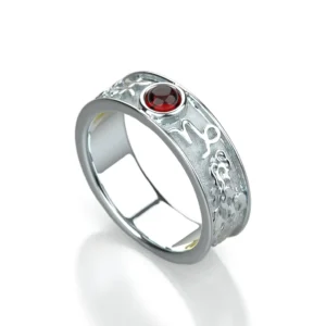 14k white gold Ring with garnet and zodiac motifs by Bruce Trick