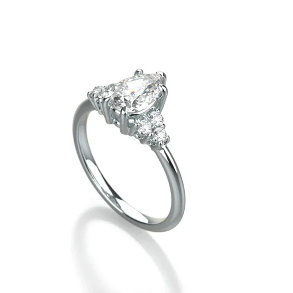 Pear cut diamond engagement ring in 14k white gold by Bruce Trick